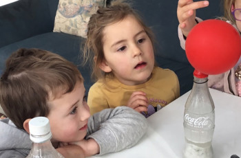 Children doing science experiment at Busy Bees Early Learning Centre in Palmerston North