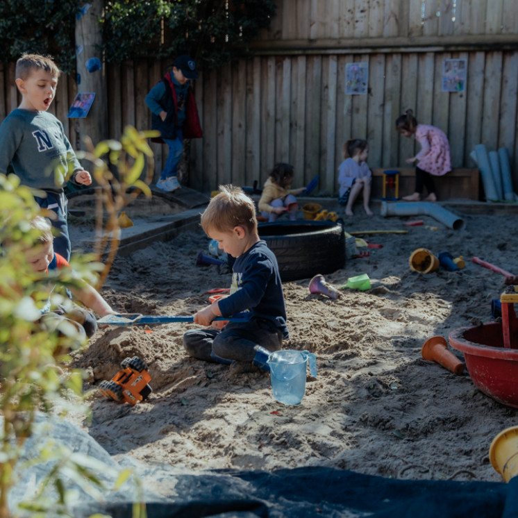 Outdoor fun in the sandpit at Busy Bees Pukekohe