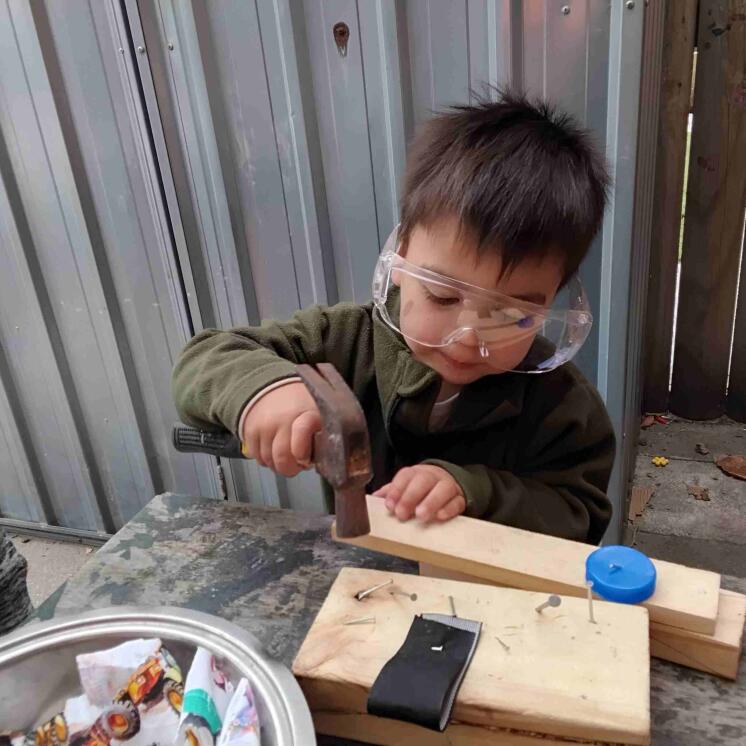 Risky play, woodworking, and practical life activity at Busy Bees Aoraki in Timaru