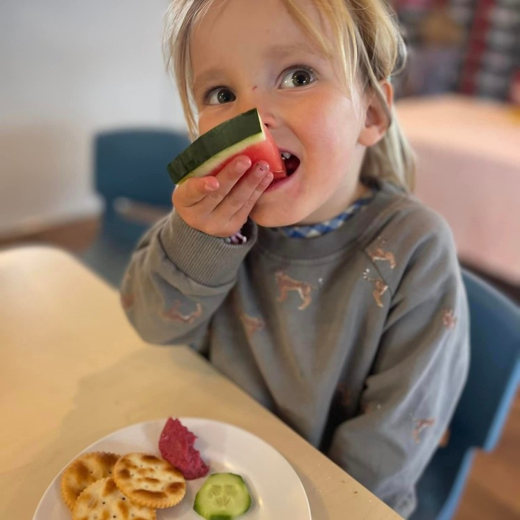 Busy Bees Ashburton Eating Furit