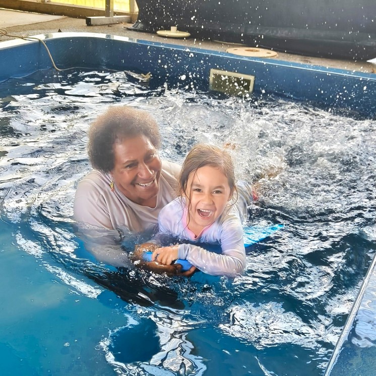 Busy Bees Cambridge childcare centre swimming at centre swimming pool for physical development and water confidence
