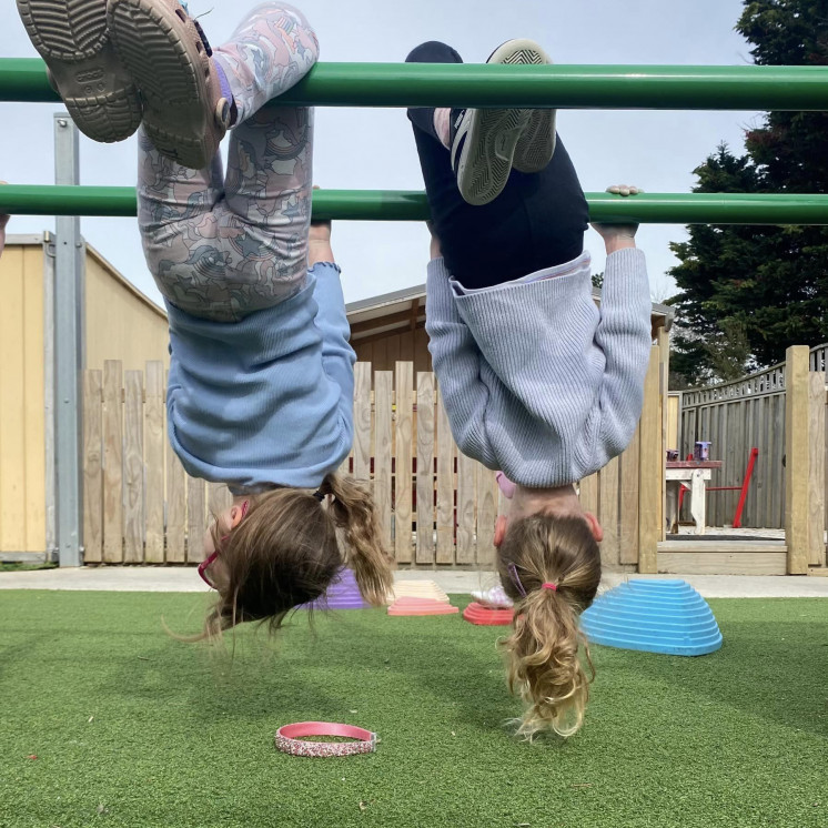 Children enjoying outside play at early childhood centre in Palmerston North at Busy Bees on Featherston Street