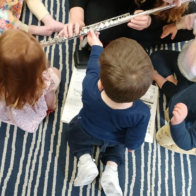 Children enjoying music at early childhood centre in Palmerston North at Busy Bees on Featherston Street