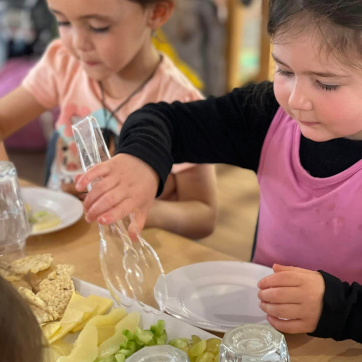 Children eating nutritious meal at early childhood centre in Palmerston North at Busy Bees on Featherston Street