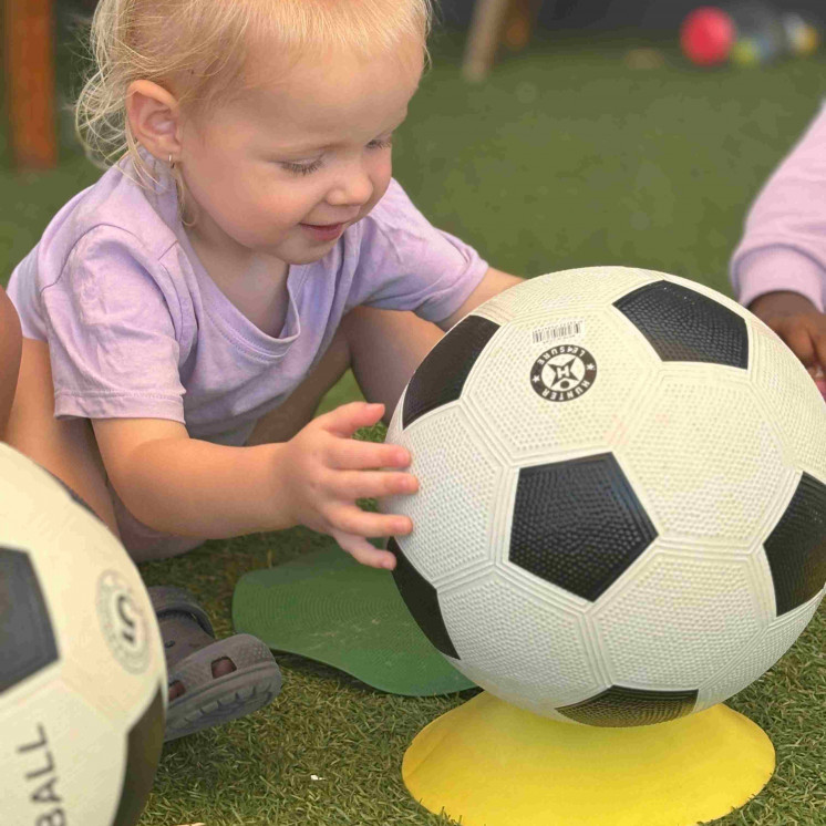 Babies playing sports in childcare centre - Hamilton East 