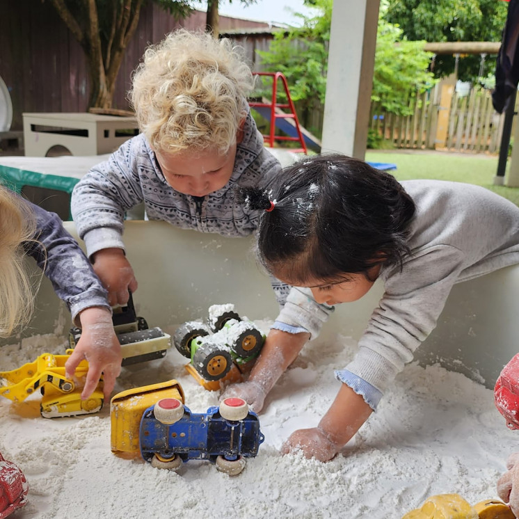 Children engrossed in sensory play at Busy Bees Hastings