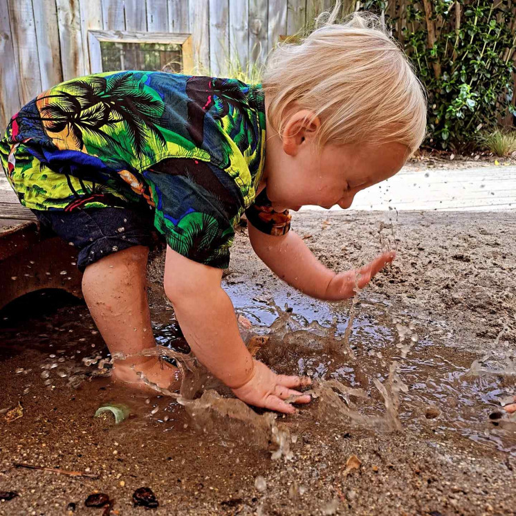 Pure joy playing in puddles at Busy Bees Havelock North