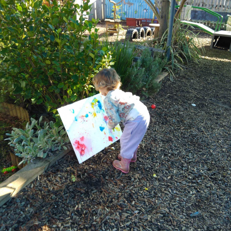 Painting in the garden large outdoor space at Busy Bees Kerikeri Nursery 