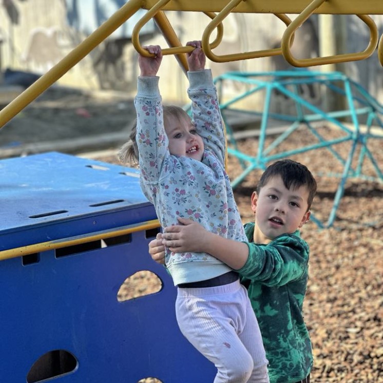 Busy Bees Mapua playground fun helping each other