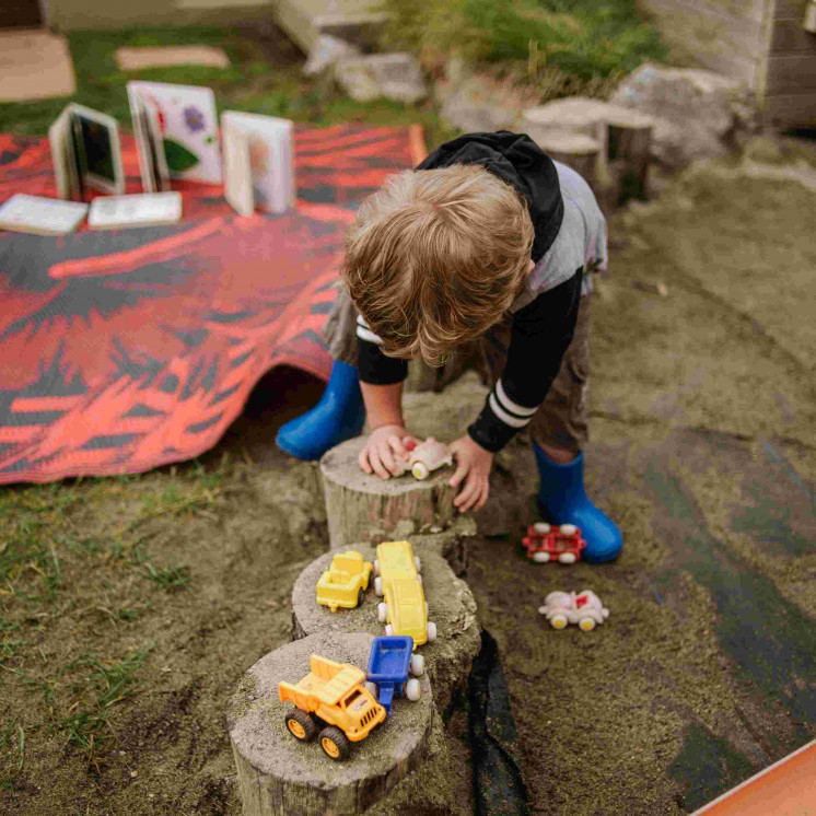 Outdoor play, cars, gumboots and learning at Busy Bees Mapua