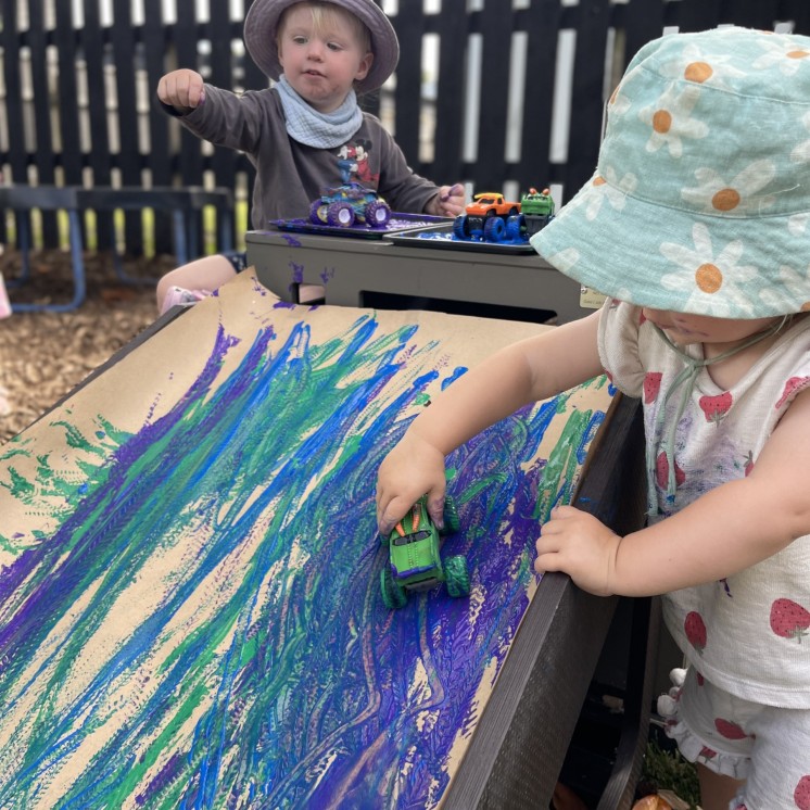 Busy Bees Martinborough childcare centre painting activities for imaginative play