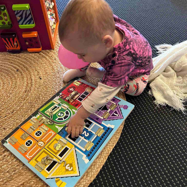 Baby fine motor skills at Busy Bees Masterton