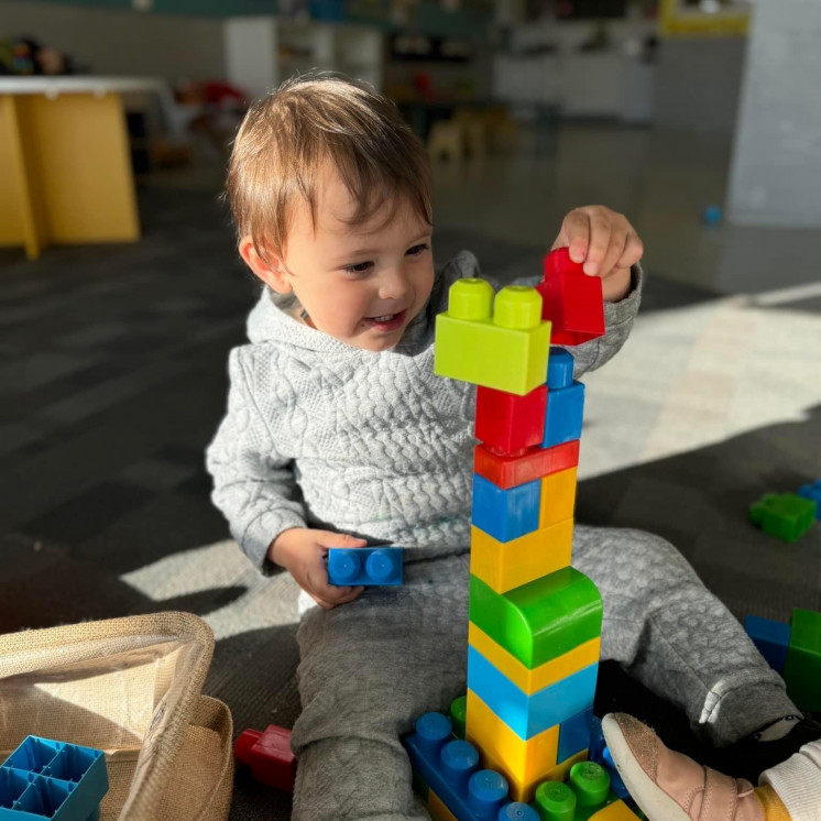 Fine Motor Skills developing for baby boy at Busy Bees Ormiston 