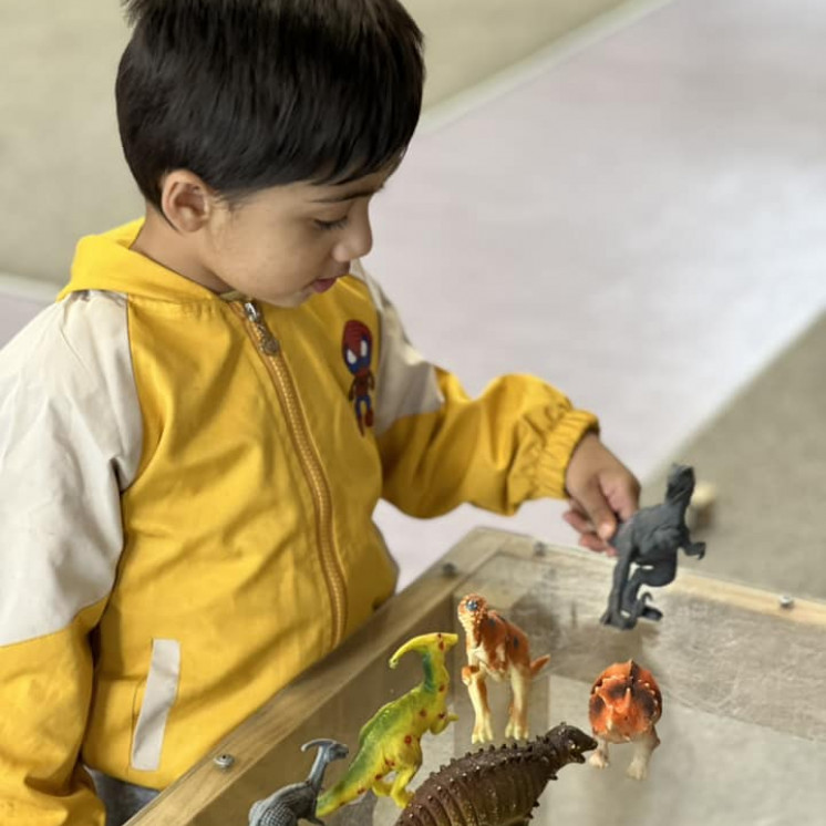 Imaginary play with dinosaurs at Busy Bees Ormiston Road