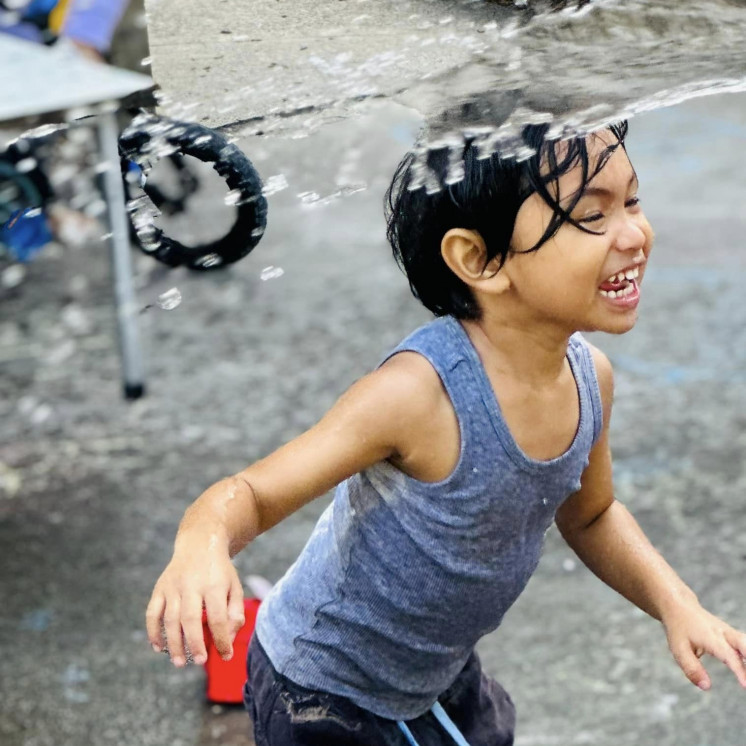 Children love playing with water at Busy Bees Ōtāhuhu