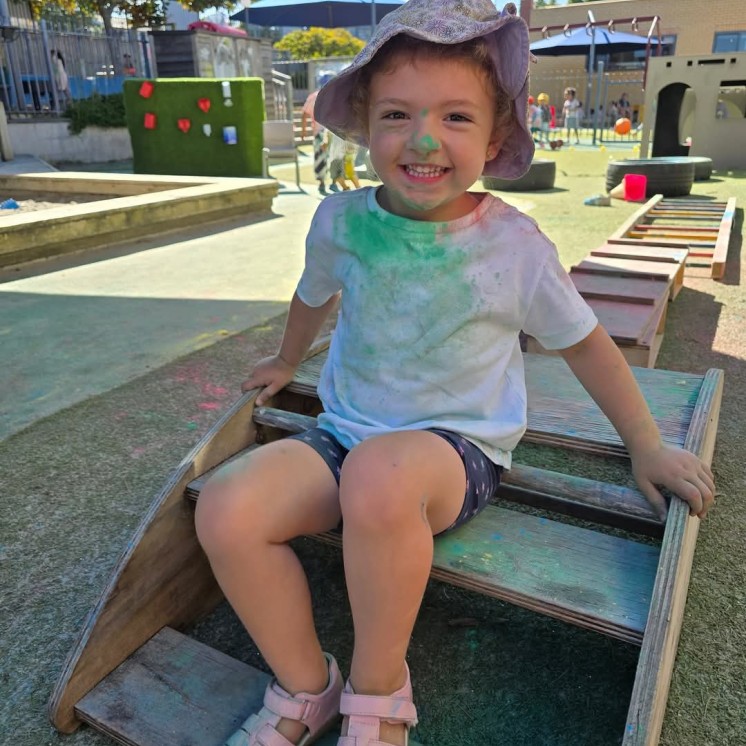 Busy Bees Pakuranga Early Learning Centre girl outside playing
