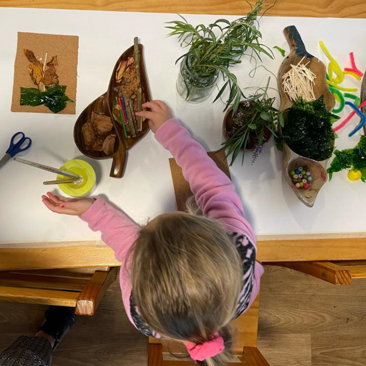 Child creating with resources at Busy Bees Pukekohe