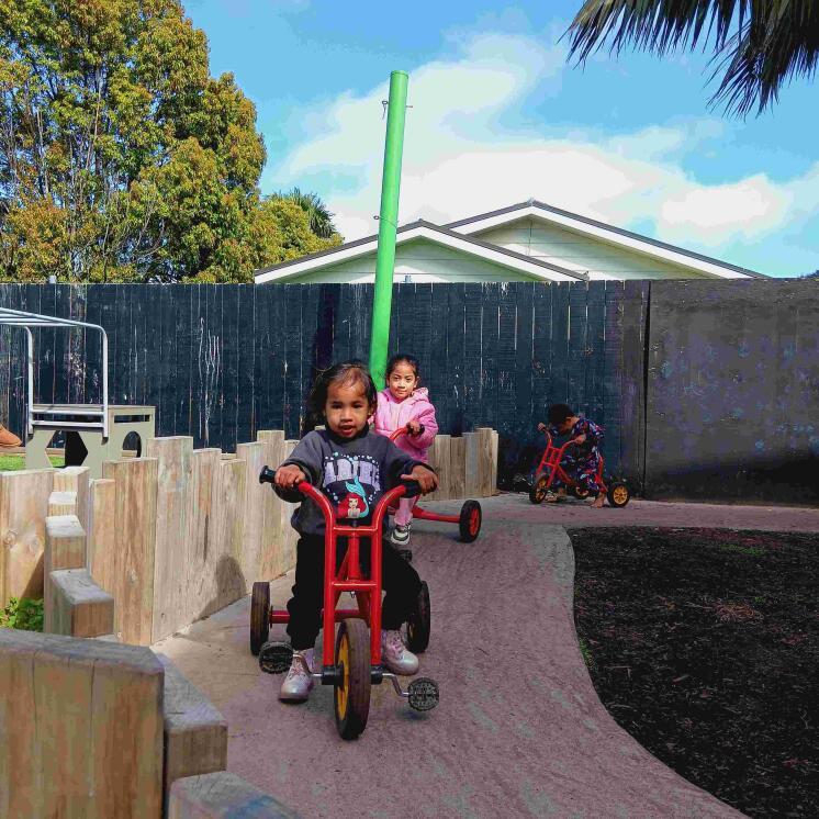 Bike track fun for preschoolers in Busy Bees Roscommon Road in Clendon Park  Childcare centre