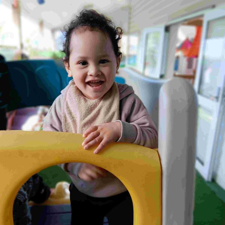 Toddler climbing in infants space at Busy Bees Roscommon Road 
