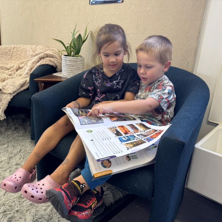 Busy Bees Rosedale reading books together