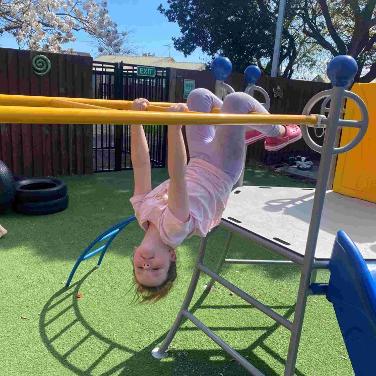 Outdoor playground playing in preschool at Busy Bees Southbrook
