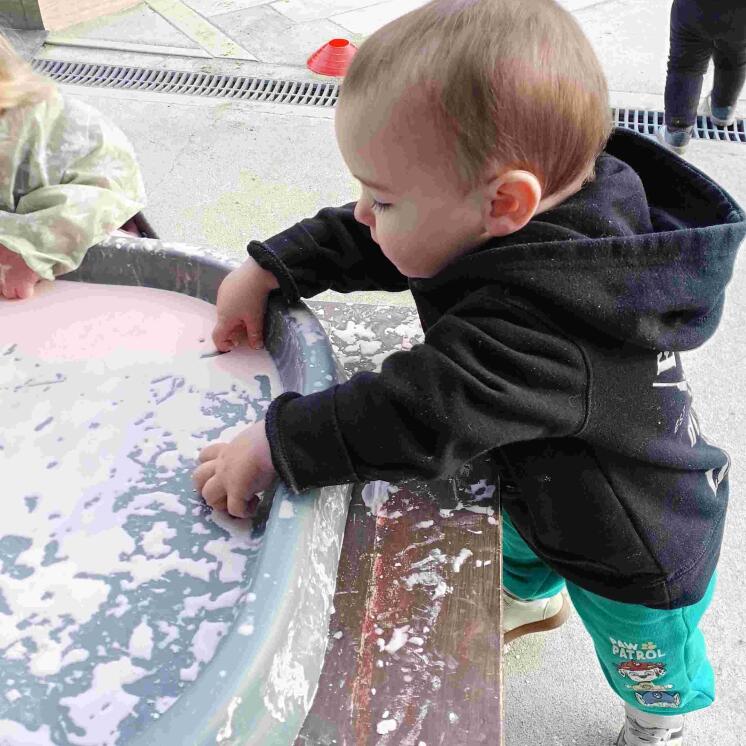 Nursery room messy play experience for babies