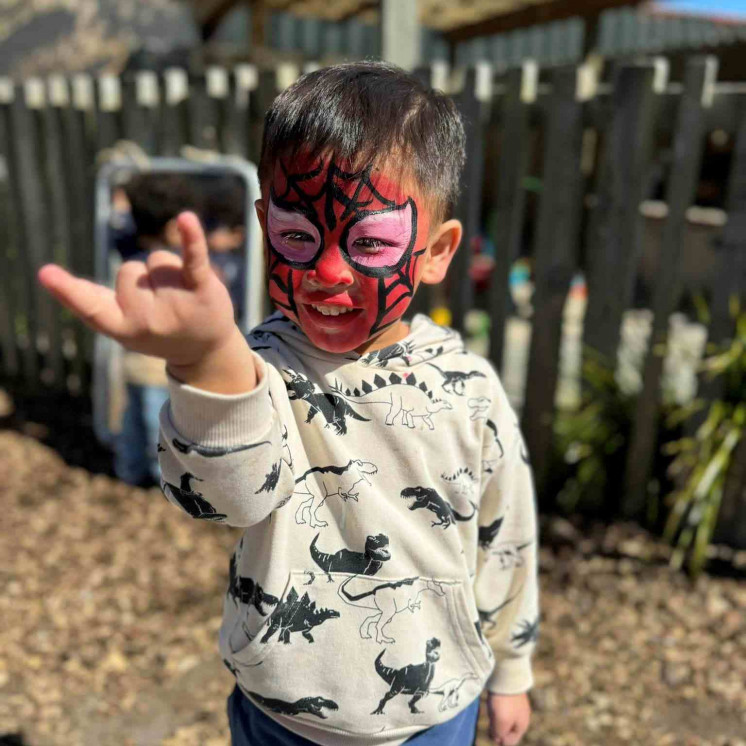 Face paint spiderman fun in preschool at Busy Bees Taupo