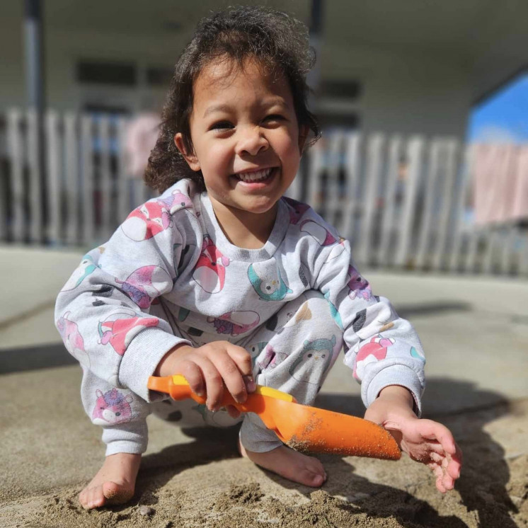 Preschool room playing in the childcare garden at Busy Bees Te Kauwhata