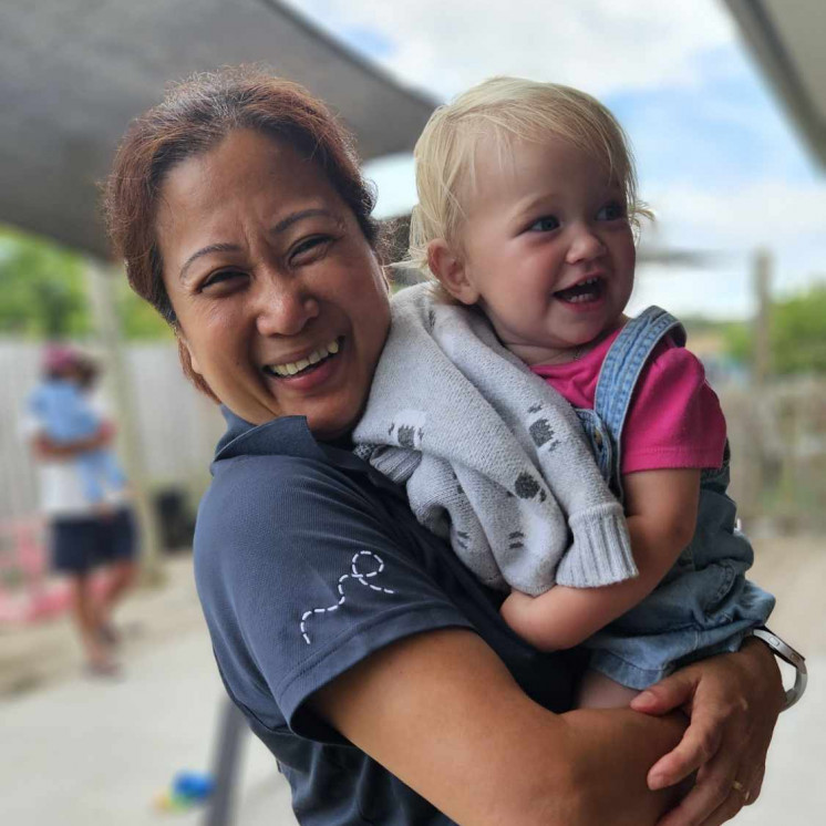 Baby developing relationships in daycare at Busy Bees Te Kauwhata