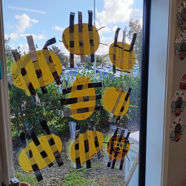 Busy Bees The Lakes Bee artwork on window