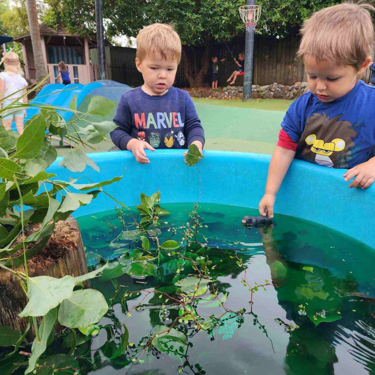Fun waterplay for toddler boys at Busy Bees Whau Valley 