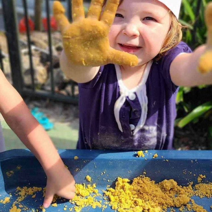 Messy play with toddlers at Busy Bees Whau Valley 