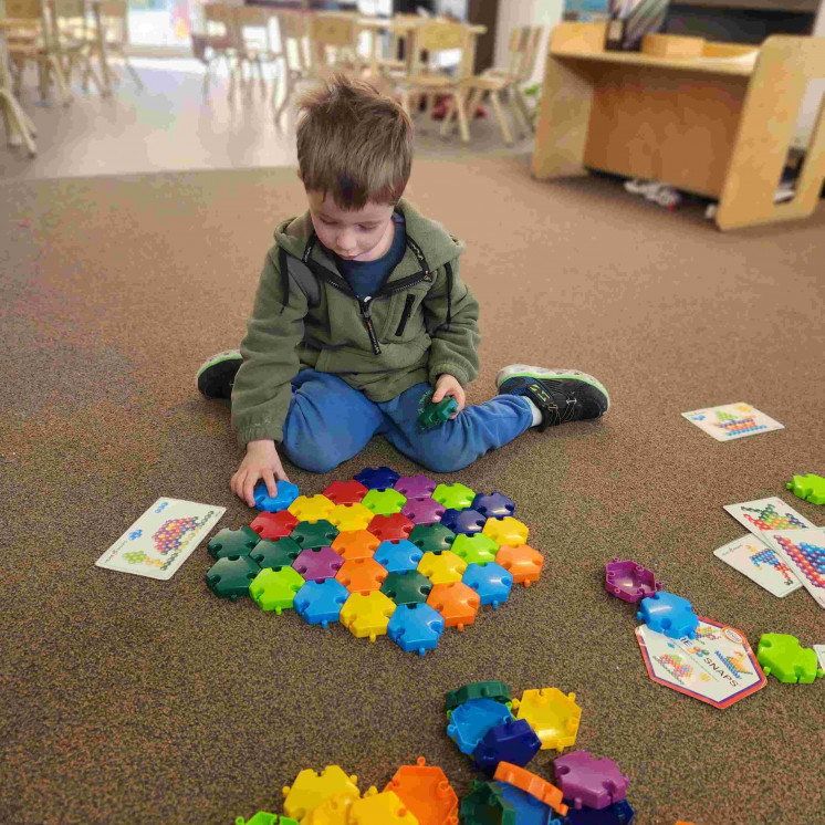 Indoor play using colourful resources in our preschool room at Hardykids Early Learning Centre in Nelson