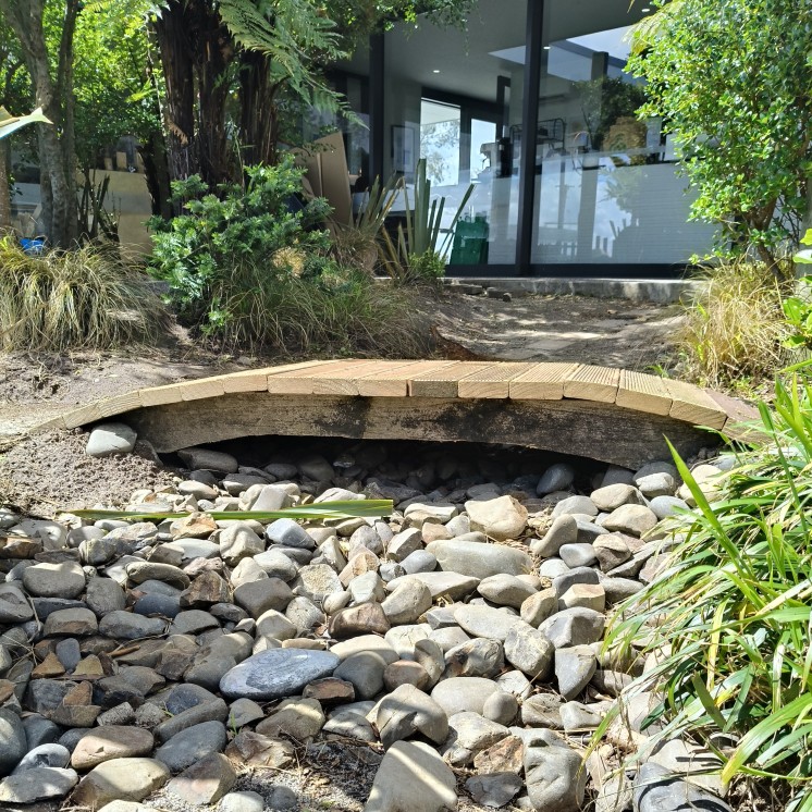 House of Wonder Forest Lake Outdoor Garden area with bridge